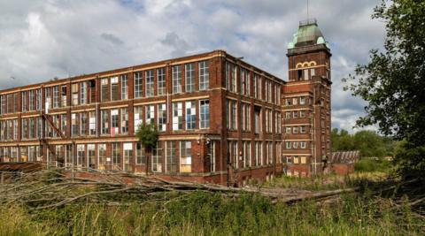 Imperial Mill in Blackburn seen from the Leeds & Liverpool Canal.