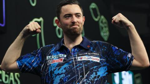 Luke Humphries after hitting a nine-darter in Wolverhampton