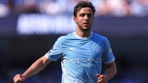 Nico Gonzalez in action for Manchester City