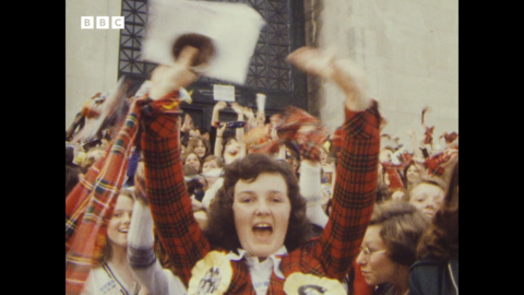 A group of women cheering 