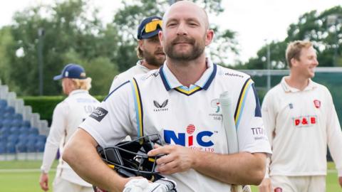 Adam Lyth walks off the field after a County Championship match