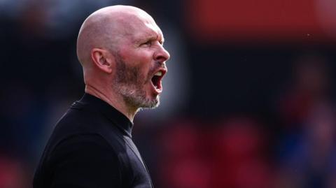 Michael Appleton shouts instructions to his players during a match