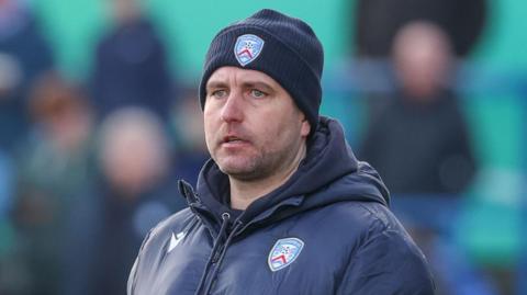 Ruaidhri Higgins watches his Coleraine team in action against Crusaders