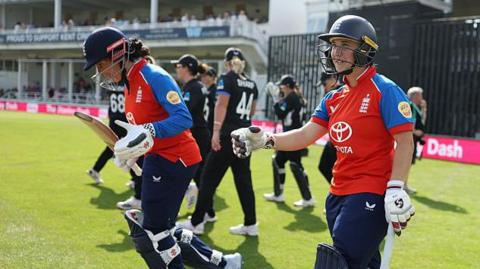 Sophia Dunkley and Alice Capsey prepare to bat