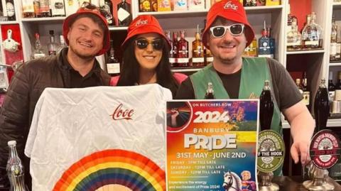 Banbury Pride committee with event merchandise