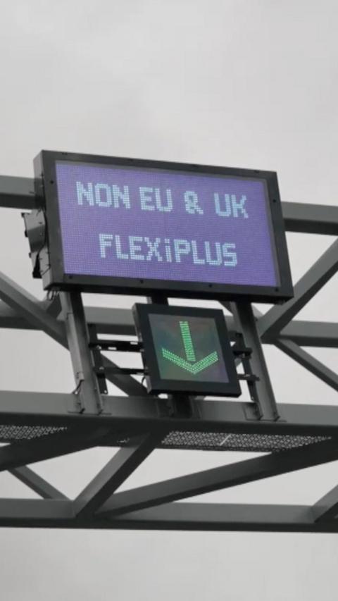 A sign directing traffic, saying "Non EU & UK Flexipass"