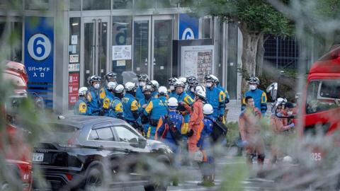 Rescue workers in Kyushu after the earthquake.