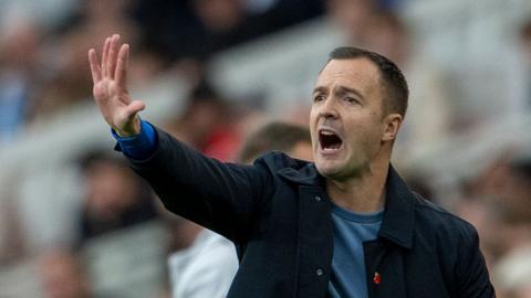 Birmingham City boss Chris Davies signals to his players during a game