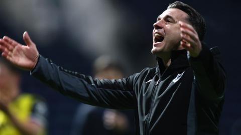 Matt Bloomfield celebrates winning