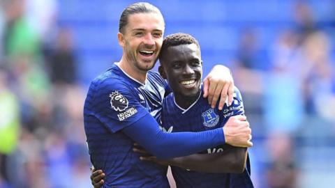 Jack Grealish and Idrissa Gueye