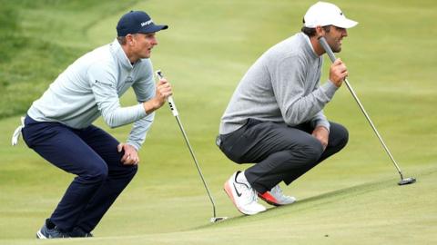 Justin Rose and Scottie Scheffler weigh up putts