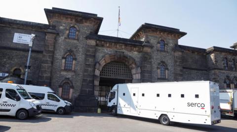 An image of a Serco-branded vehicle driving into Wandsworth prison. 