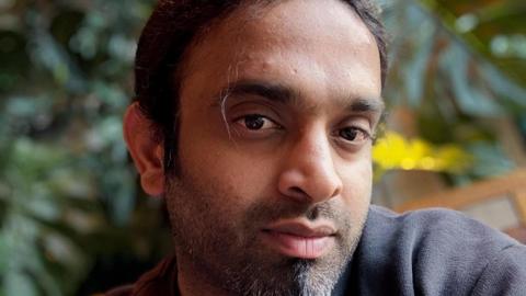 Pic of man with stubble and grey top