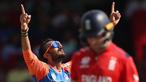 India bowler Axar Patel celebrates taking a wicket