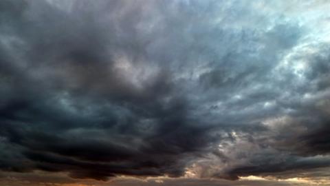 Storm clouds brewing in the sky - stock photo