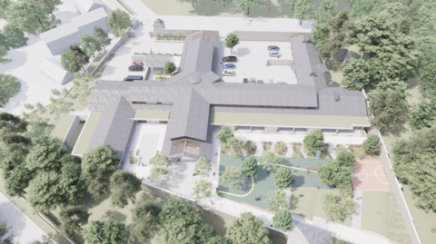An artist's impression of the aerial view of a large complex with a car park and outdoor play areas