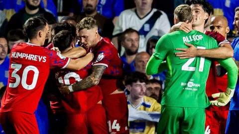 Birmingham City and Ipswich Town players get involved in a scuffle and confrontation at the end of their Championship match following the award of a controversial penalty