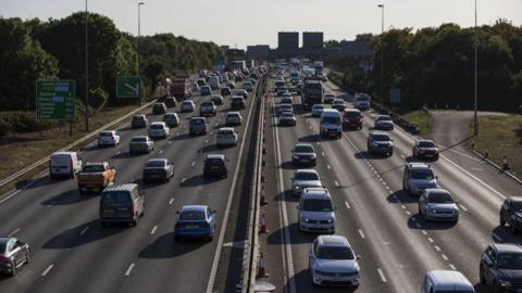 Traffic travels in both directions on the M20 motorway near Dartford, UK, on Wednesday 18 Sept 2019