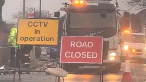 Debris scattered along the road