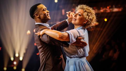 Alex Kingston and Johannes Radebe perform the Waltz during week 8 of Strictly Come Dancing Credit: BBC/Guy Levy