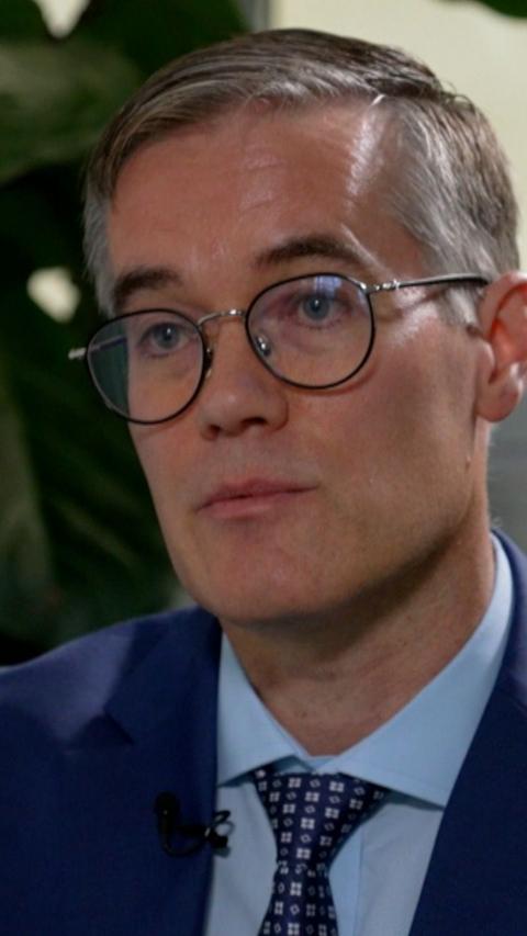 Manchester Airport's managing director Chris Woodroofe speaking to Roger Johnson
