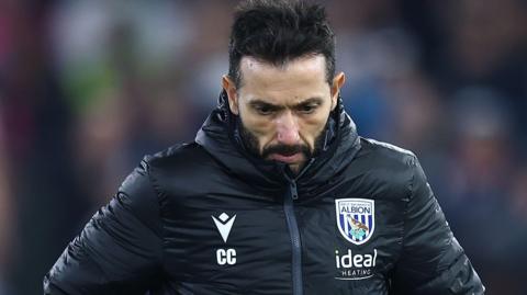 West Bromwich Albion head coach Carlos Corberan looking down