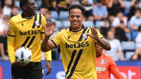 Million Manhoef celebrates his goal against Sheffield Wednesday