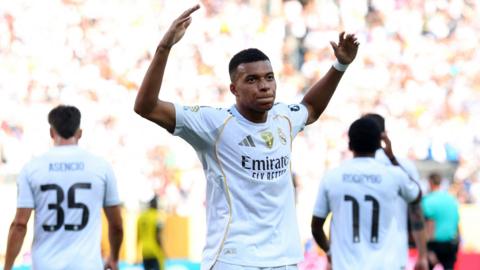 Kylian Mbappe celebrates
