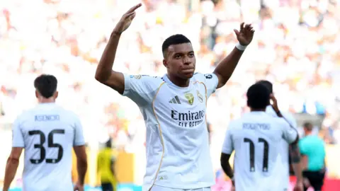 Kylian Mbappe celebrates