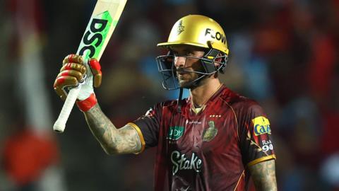 Alex Hales celebrates hitting a half-century for Trinbago Knight Riders to against Antigua & Barbuda Falcons