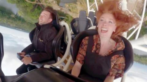 Hannah Fry and an employee at Thorpe Park on a rollercoaster.