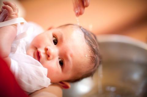 A 6 month old baby boy is baptized