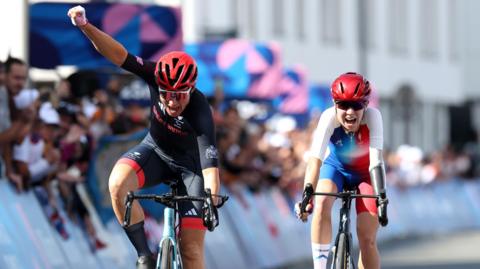 Sarah Storey celebrates winning the road race at the Paralympics  
