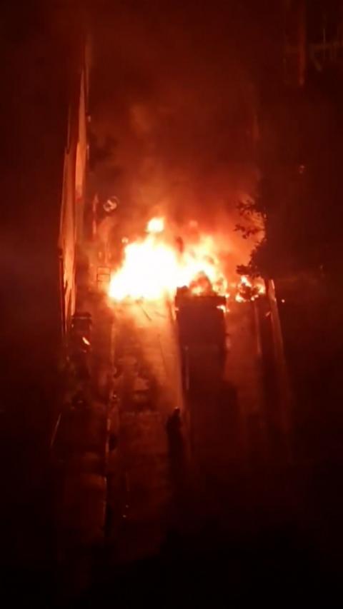 A fire burns in a street in Glasgow.