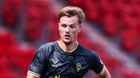 Oscar Thorn in action for Lincoln City in pre-season during the 2026-27 season