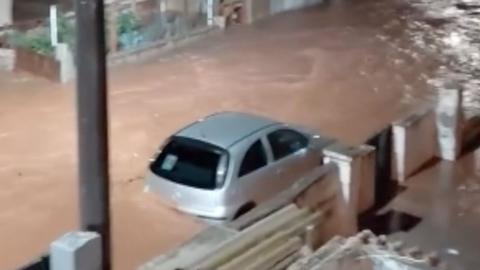 A car submerged in floodwater after Storm Byron hits Greece