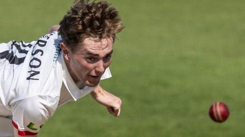 George Balderson bowling for Lancashire