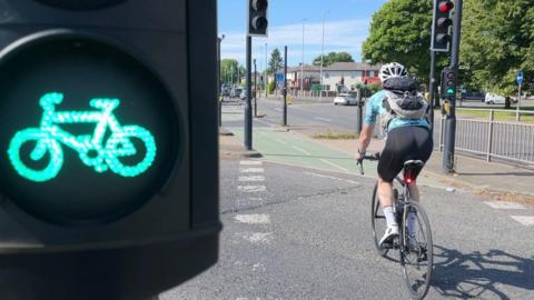 Man cycling on the Bradford Leeds Cycle Superhighway