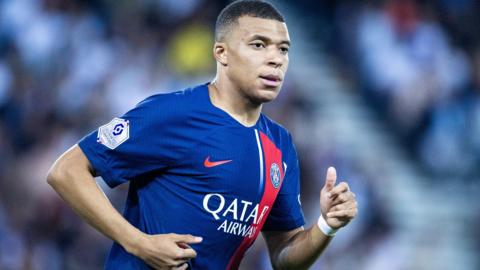 Kylian Mbappe playing for Paris St-Germain