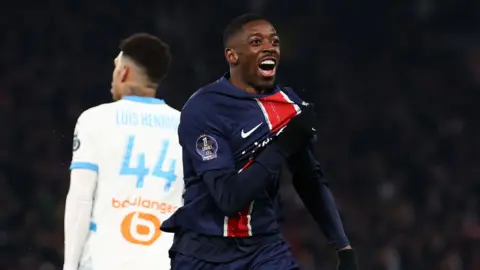 Ousmane Dembele celebrates scoring against Marseille