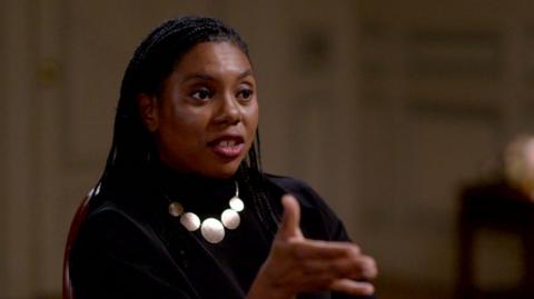 Kemi Badenoch makes a point with her hand in an interview