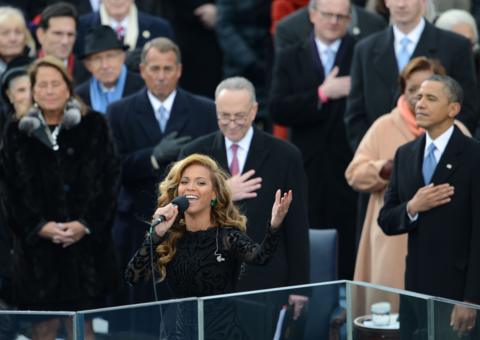 Singer Beyonce Knowles, dressed in black singing the Star-Spangled Banner at President Obama's 2013 inauguration