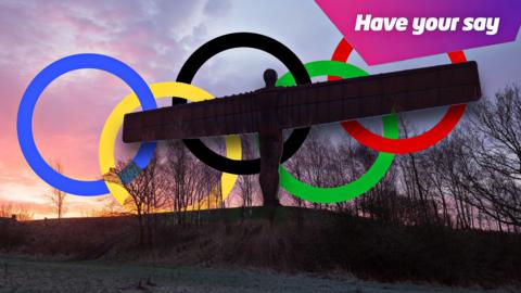 Angel of the north with the Olympic rings behind it.