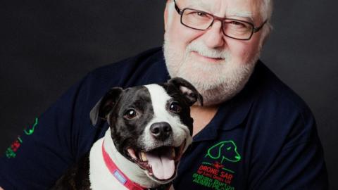 Graham Burton with a dog