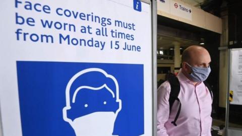 Man wearing mask on public transport