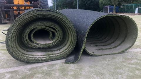 The rolled up AstroTurf