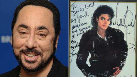 David Gest and a signed photo of Michael Jackson