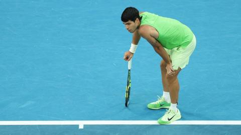 Carlos Alcaraz suffering from a cramp in the Australian Open