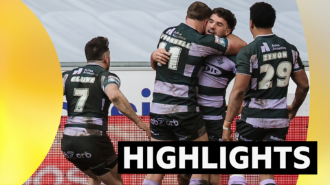 Connor Wrench of Huddersfield celebrates with Asher O'Donnell, Tanguy Zenon and Adam Clune after scoring a try