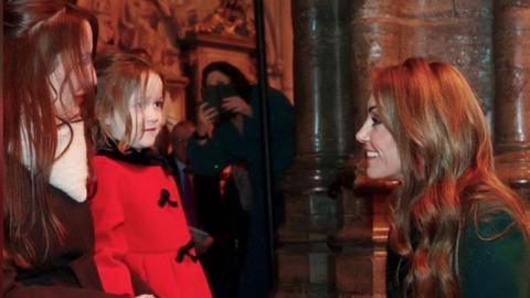 A close up of the moment the Princess of Wales is kneeling down to speak to Heather Johnstone and her daughter.
